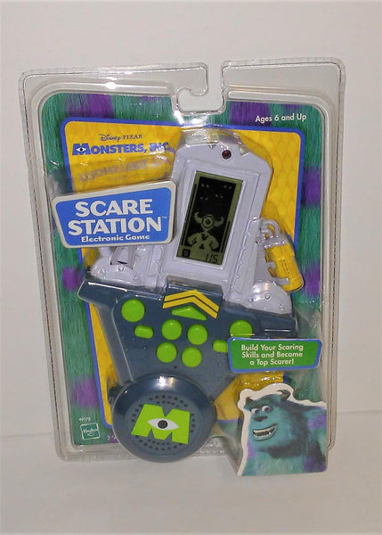 monsters inc door station Disney Pixar Monsters, Inc. SCARE STATION Electronic Handheld Game from 2001